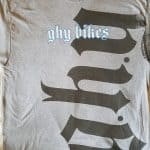 Photo of screen printed tee with oversized image bleeding off torso to sleeve