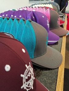 Photo of custom caps where thread color changes to match cap accents