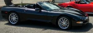Cropped photo of black Corvette roadster