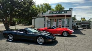 Photo of corvette roadsters at gas station