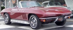 Cropped photo fo vintage burgundy Corvette convertible